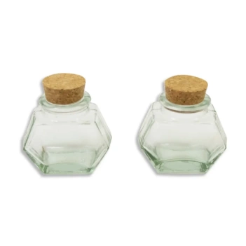 SUPER OFERTA **40%** Set 2 frascos hexagonales con tapón de corcho